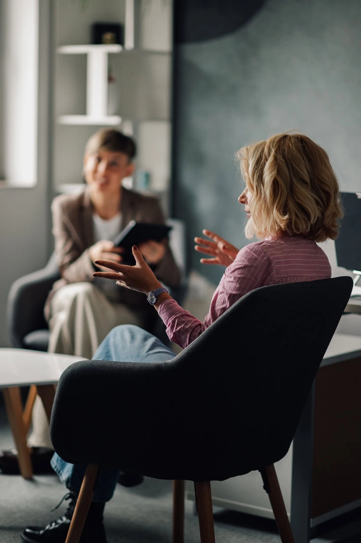 A woman participates in mental health treatment.