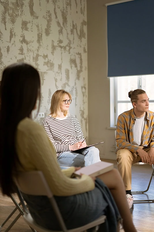People participate in mental health treatment.