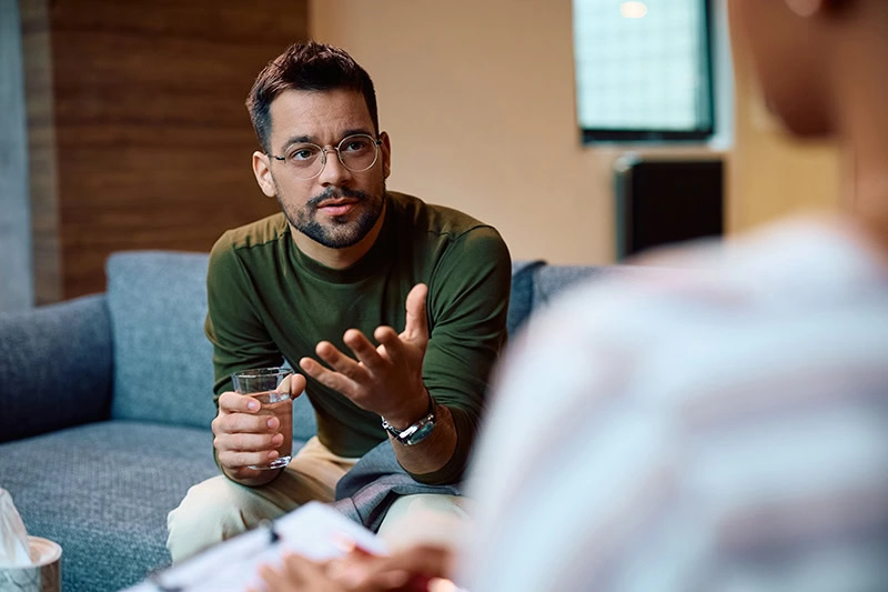 A man participates in mental health treatment.